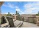 Inviting deck featuring stylish lounge chairs and scenic views, perfect for relaxation and outdoor enjoyment at 3266 Coyote Hills Way, Castle Rock, CO 80109