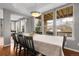 Bright dining room featuring large windows with natural light and an view to the exterior at 3266 Coyote Hills Way, Castle Rock, CO 80109
