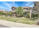View of the home's exterior showcasing the architectural details and landscaping on a sunny day at 3266 Coyote Hills Way, Castle Rock, CO 80109