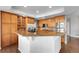 Gourmet kitchen boasts a large island, stainless steel appliances, and hardwood floors at 3266 Coyote Hills Way, Castle Rock, CO 80109
