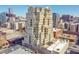 Stunning exterior of a high-rise building featuring balconies and rooftop terrace overlooking the city skyline at 300 W 11Th Ave # 8C, Denver, CO 80204
