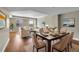 Elegant living and dining area with hardwood floors and neutral décor filled with natural light at 300 W 11Th Ave # 8C, Denver, CO 80204