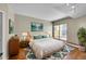 Inviting main bedroom with hardwood floors, a private balcony, and ample natural light at 300 W 11Th Ave # 8C, Denver, CO 80204