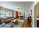 Inviting living room with natural light, neutral tones, and stylish decor creates a comfortable and welcoming space at 4825 S Delaware St, Englewood, CO 80110