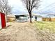 This home's backyard is a spacious outdoor area with a deck and a fenced yard at 7901 Newport St, Commerce City, CO 80022