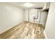 Unfinished basement with new vinyl floors and updated plumbing at 7901 Newport St, Commerce City, CO 80022