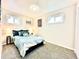 Cozy bedroom featuring comfortable bedding, ample natural light, and stylish decor at 7901 Newport St, Commerce City, CO 80022