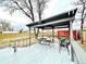 Outdoor deck area with covered seating, perfect for relaxing or entertaining at 7901 Newport St, Commerce City, CO 80022