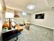 Inviting living room featuring a contemporary sofa, stylish coffee table, and cozy decor at 7901 Newport St, Commerce City, CO 80022