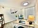 Bright office features desk, decor, and a comfortable chair at 7901 Newport St, Commerce City, CO 80022
