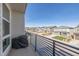 Balcony with railing featuring mountain views at 11400 W Grand Ave, Littleton, CO 80127