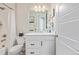 Bright bathroom with updated vanity, lighting, and shower at 11400 W Grand Ave, Littleton, CO 80127