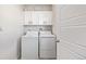 Convenient laundry room with modern washer and dryer units at 11400 W Grand Ave, Littleton, CO 80127