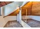 Charming loft bedroom with wood ceilings and a staircase at 2222 Fenton St, Edgewater, CO 80214