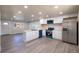 Modern kitchen with stainless steel appliances and island at 5341 Granby St, Denver, CO 80239