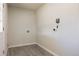 Spacious laundry room with utility connections and vinyl flooring at 5341 Granby St, Denver, CO 80239