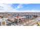 Wide aerial view of the townhome and surrounding area at 2946 Central Park Blvd, Denver, CO 80238