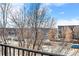 View from balcony showcases neighborhood and cityscape at 2946 Central Park Blvd, Denver, CO 80238