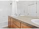 Clean bathroom with shower/tub combo and updated vanity at 2946 Central Park Blvd, Denver, CO 80238