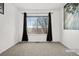 Spacious bedroom with large window and neutral decor at 2946 Central Park Blvd, Denver, CO 80238