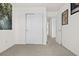 Bright bedroom with double-door closet and access to hallway at 2946 Central Park Blvd, Denver, CO 80238