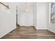 Bright entryway with wood floors and staircase at 2946 Central Park Blvd, Denver, CO 80238