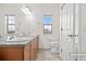 Primary bathroom boasts dual sinks and a large vanity at 2946 Central Park Blvd, Denver, CO 80238