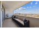 Relax on the spacious balcony with comfortable seating and stunning city views at 1250 N Humboldt St # 1504, Denver, CO 80218