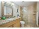 Modern bathroom featuring a stylish vanity and a walk-in glass shower at 1250 N Humboldt St # 1504, Denver, CO 80218