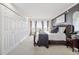 Main bedroom features carpet, lots of closet space, and a view of the city skyline at 1250 N Humboldt St # 1504, Denver, CO 80218