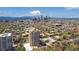 Stunning aerial view of the city skyline with mountain views and residential areas at 1250 N Humboldt St # 1504, Denver, CO 80218