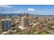 Breathtaking aerial view of the city skyline with mountains in the distance at 1250 N Humboldt St # 1504, Denver, CO 80218
