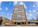 Modern high-rise apartment building featuring an elegant facade with multiple balconies and stunning city views at 1250 N Humboldt St # 1504, Denver, CO 80218