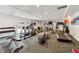 Well-lit gym featuring treadmills, elliptical machines, and weightlifting equipment at 1250 N Humboldt St # 1504, Denver, CO 80218