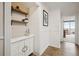 Bright hallway featuring stylish decor and access to a balcony with city views at 1250 N Humboldt St # 1504, Denver, CO 80218