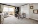Well-lit office with a balcony and a built-in Murphy bed/storage at 1250 N Humboldt St # 1504, Denver, CO 80218
