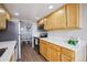 Bright kitchen features stainless steel appliances, ample cabinet storage and adjacent dining area at 1250 N Humboldt St # 1504, Denver, CO 80218