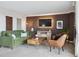 Comfortable living area featuring plush seating, a modern entertainment center, and chic decor at 1250 N Humboldt St # 1504, Denver, CO 80218