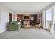 Cozy living room featuring stylish furniture, modern decor, and access to a private balcony at 1250 N Humboldt St # 1504, Denver, CO 80218