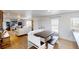 Farmhouse-style dining area with adjacent living space at 43620 E 80Th Ave, Bennett, CO 80102