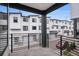 View from the balcony of the modern home exterior at 2066 S Holly St # 3, Denver, CO 80222