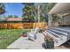Backyard featuring a patio, fire pit, and a well-maintained lawn at 3975 S Logan St, Englewood, CO 80113