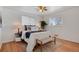 Cozy bedroom with hardwood floors and a ceiling fan at 6642 S Bridger Ct, Centennial, CO 80121