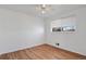 Simple bedroom with hardwood floors and ceiling fan at 6642 S Bridger Ct, Centennial, CO 80121