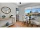 Charming breakfast nook with a round table and chairs near a kitchen at 6642 S Bridger Ct, Centennial, CO 80121