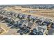 Picturesque neighborhood featuring well-maintained homes, sidewalks, and mature trees at 7976 E 53Rd Dr, Denver, CO 80238