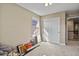 Bedroom featuring a closet and natural light with a view of the neighborhood at 7976 E 53Rd Dr, Denver, CO 80238