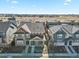 Charming two-story home with inviting front porch and well-maintained landscaping at 7976 E 53Rd Dr, Denver, CO 80238