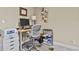 Functional home office space with modern desk and ample storage at 7976 E 53Rd Dr, Denver, CO 80238