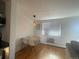 Bright dining area with a modern table set near a window, perfect for meals at 529 N Washington St # 304, Denver, CO 80203
